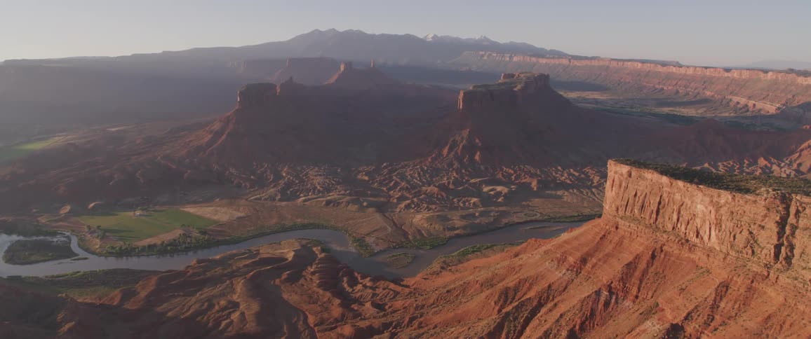 An aerial view of a desert is displayed