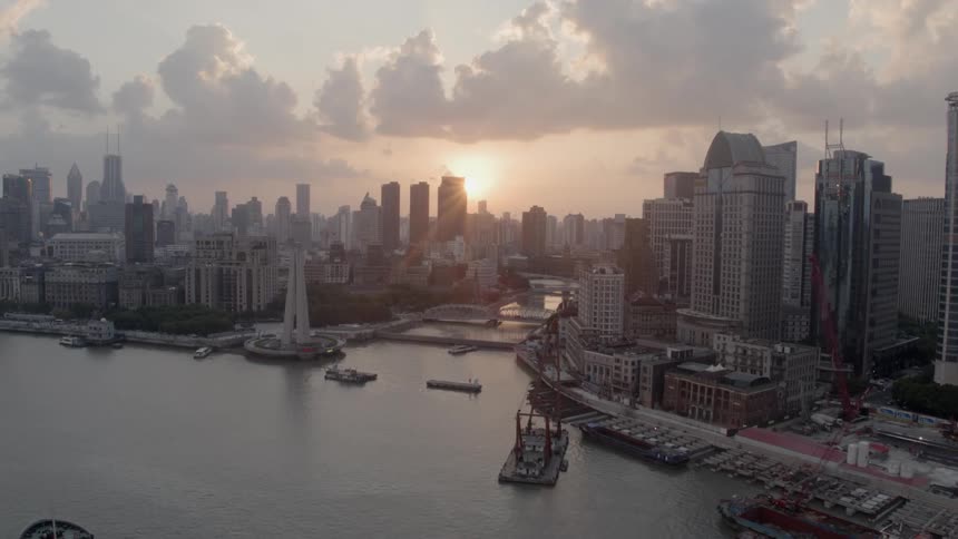 Aerial shot of the Bund River in Shanghai at sunset