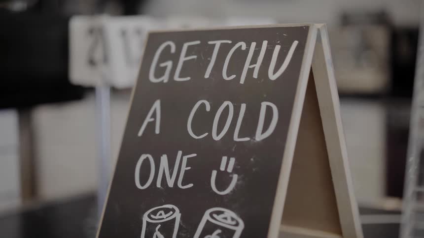 Sign in restaurant advertising drinks