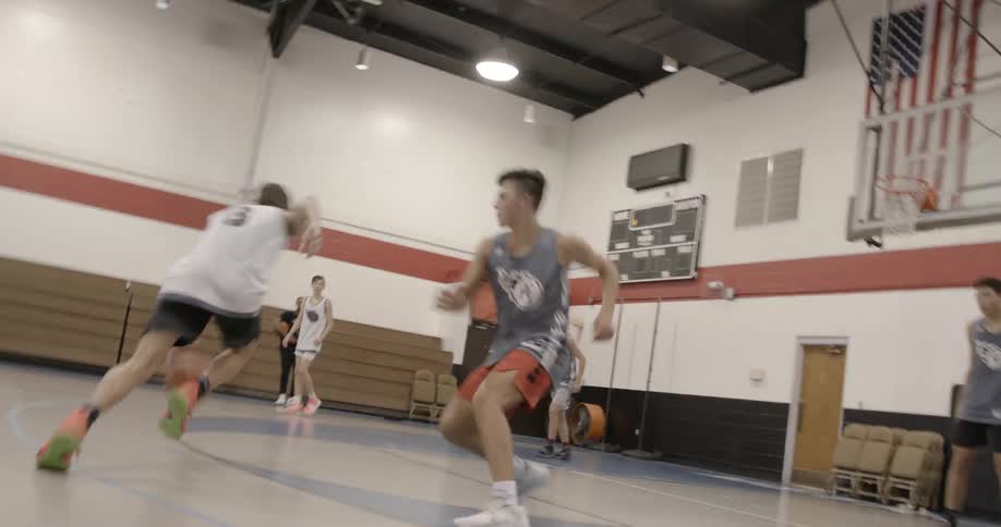 Boys playing basketball