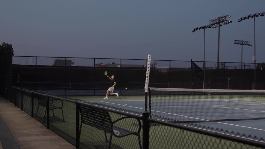 Male playing with tennis