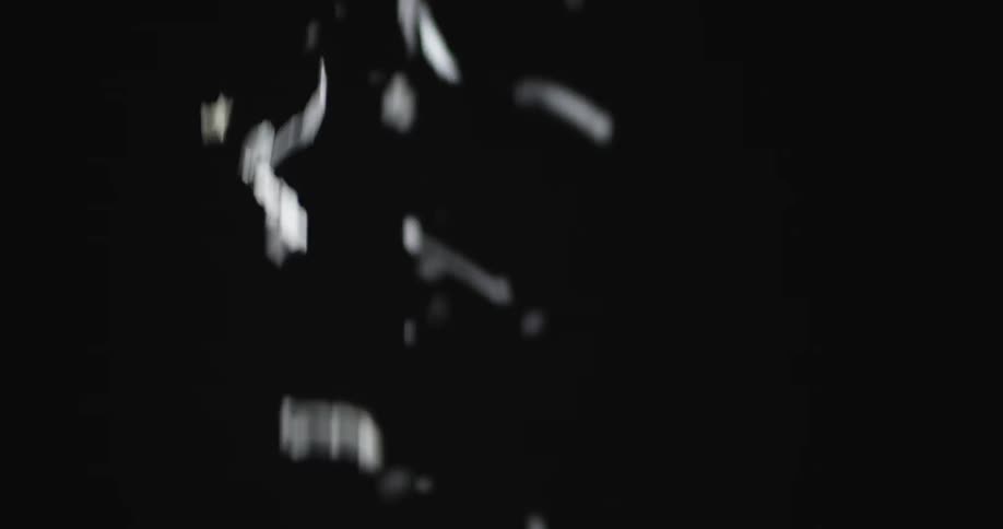 White objects fall to the ground