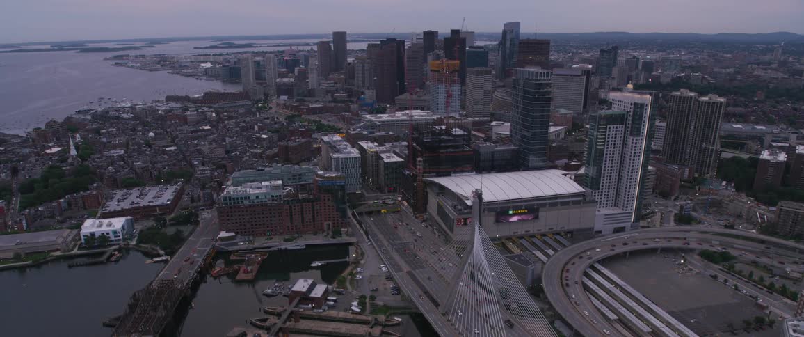Cars travel across the zakim bridge heading into boston