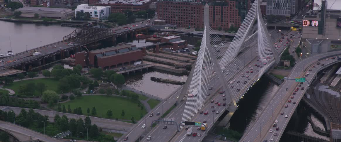 Traffic moves across a city's suspension bridge