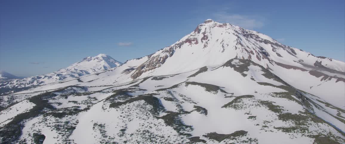 Snowy barren rocky mountain in wintertime