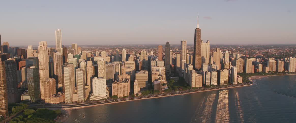 Traffic moves along on the edge of a city