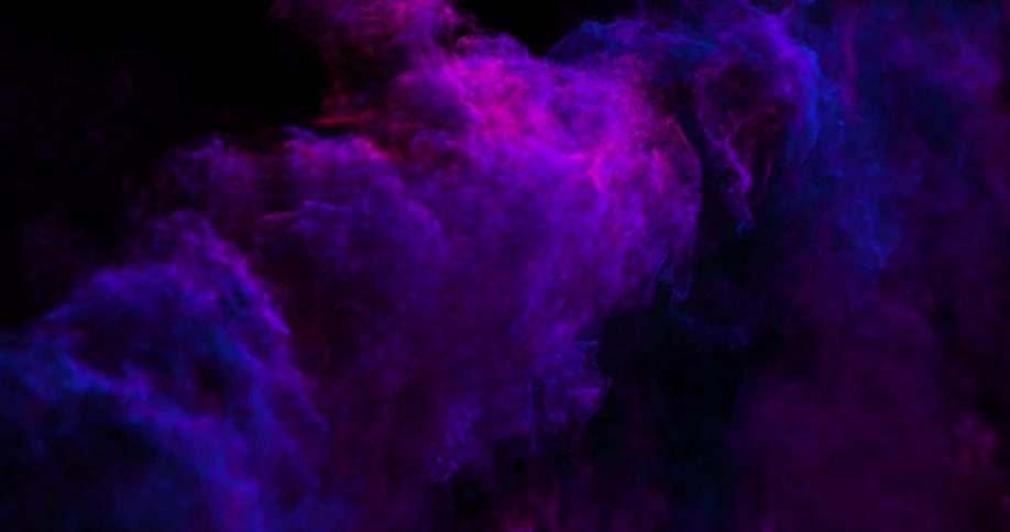 Red smoke rises and diffuses