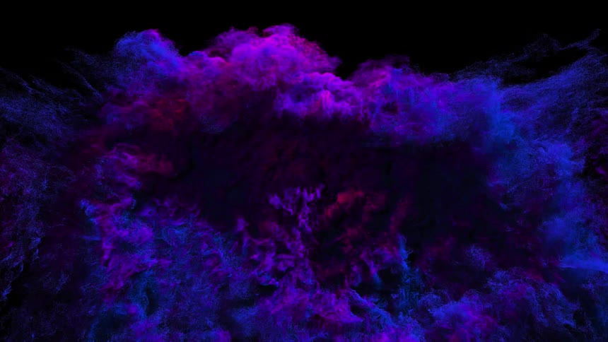 Iridescent blue and violet smoke exploding towards the camera in the darkness
