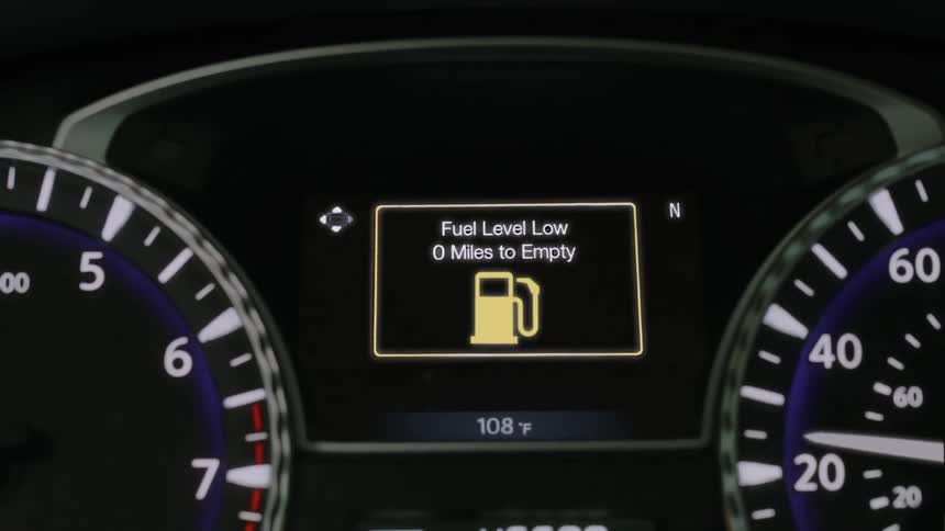 Low fuel light is blinking on car console