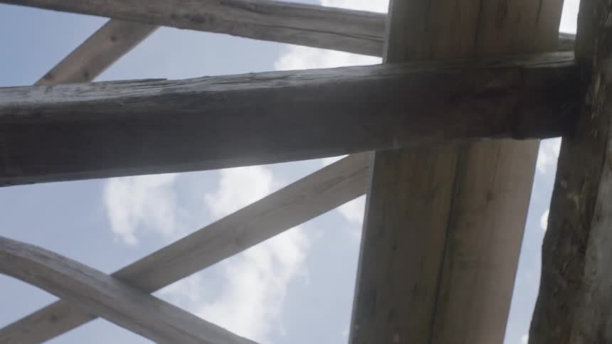 Worms eye view of a broken roof