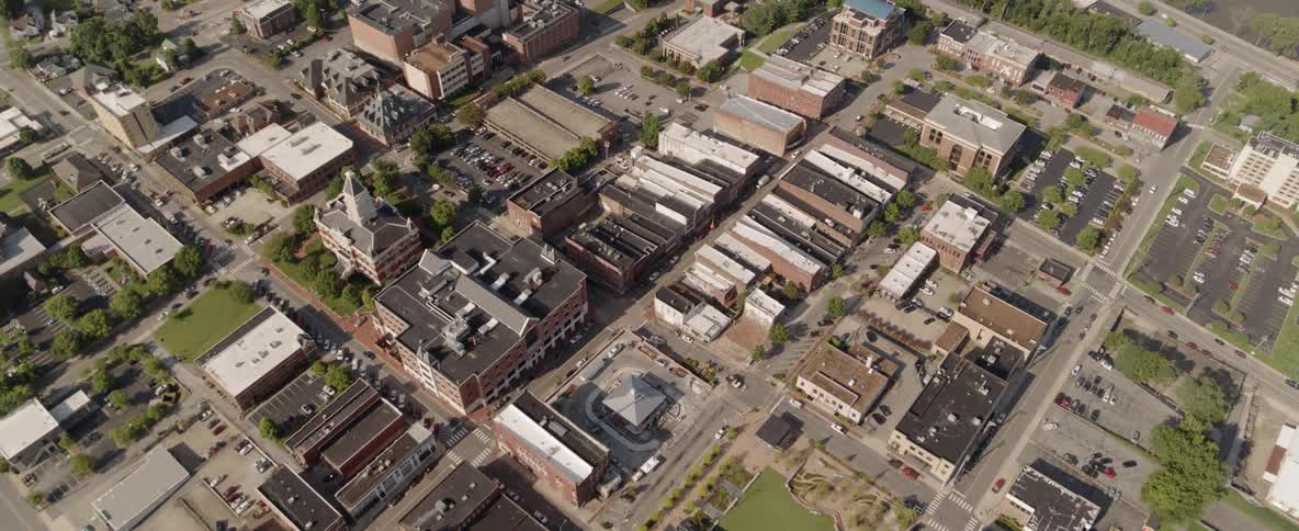 An aerial view of a town on a sunny day