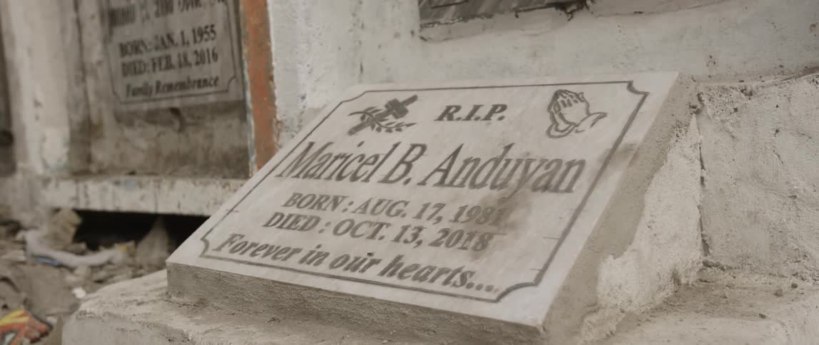 Grave marker near mausoleum