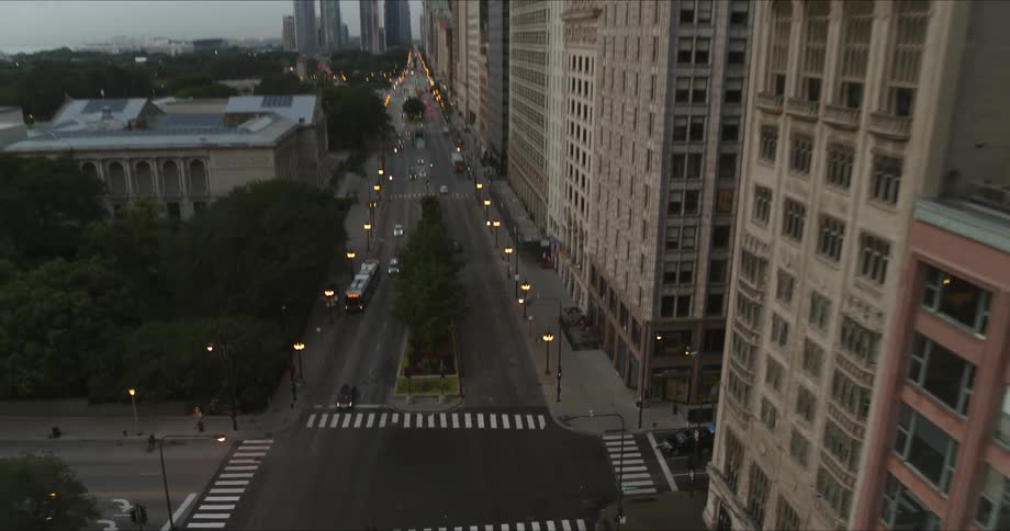 Aerial view of city street and skyline