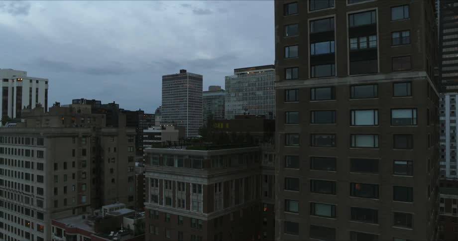 City skyline with apartments and buildings and a lake