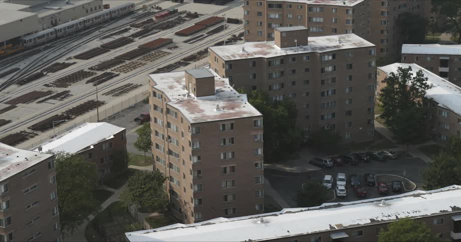 A row of apartment buildings during the day