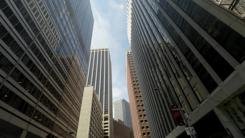 A city is shown during the day