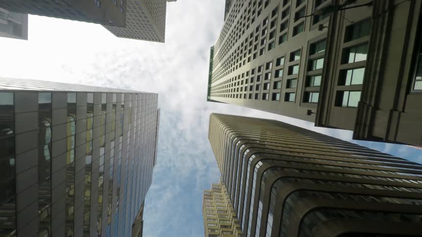 Looking up at buildings in a city