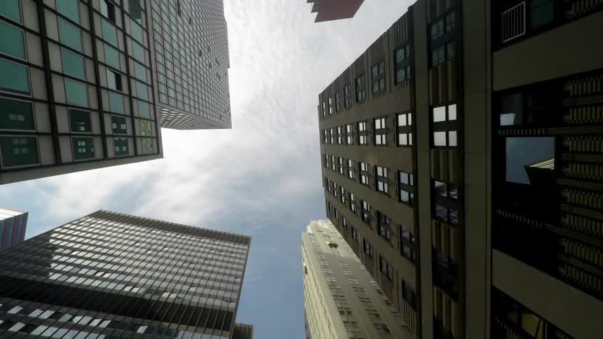 Looking up at buildings in a city