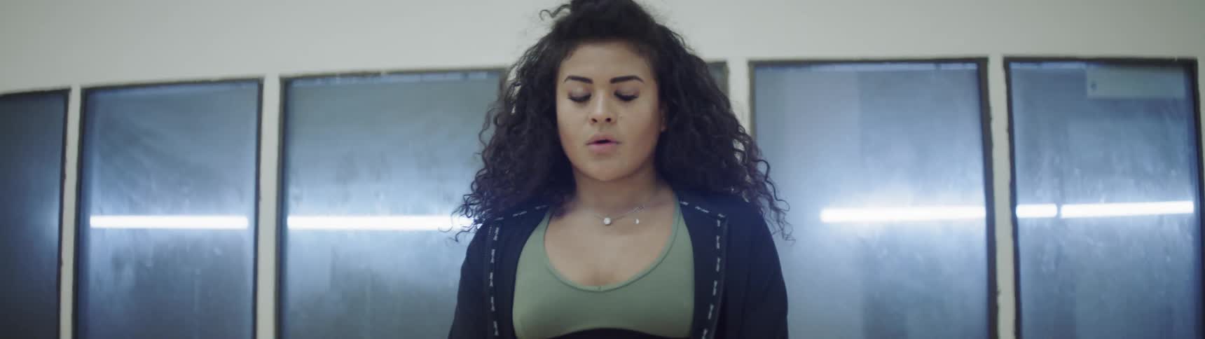 Teenage girl deep breathing with eyes closed