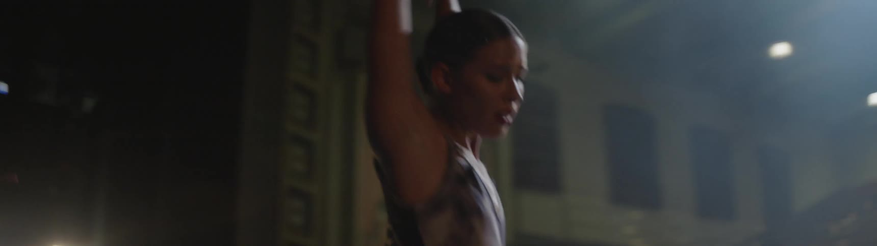 A ballerina dances on a stage