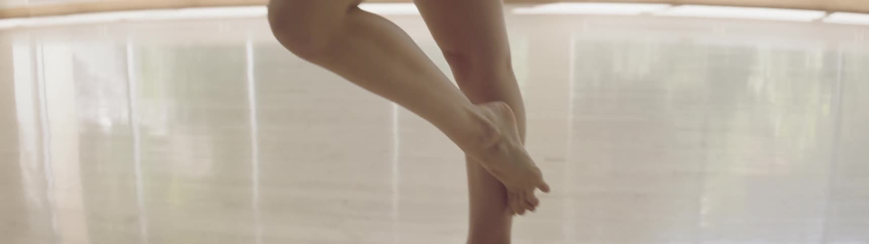 A young girl does ballet