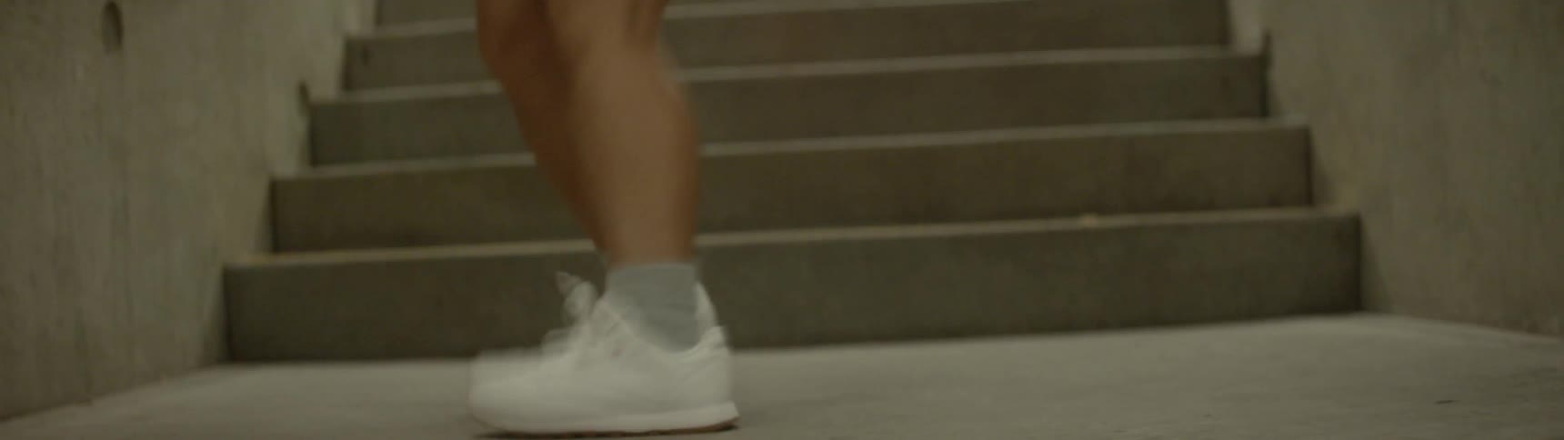Dance dances on landing of stairs