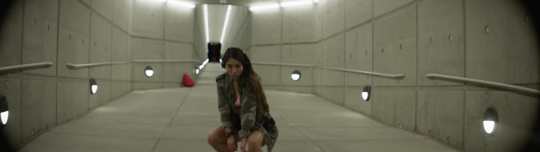 Woman dancing on a hallway