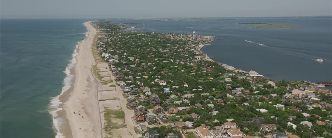A beach and city surrounded by a body of water