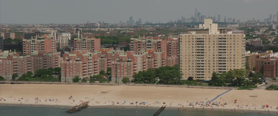 Skyline view with a beach and city behind