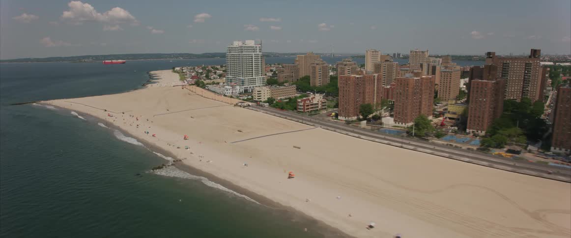 The beach with the city skyline behind it