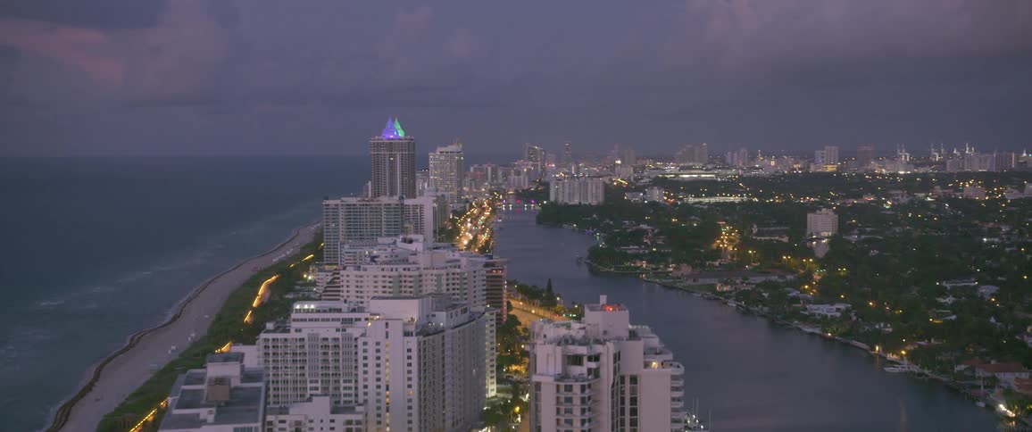 Tall skyscrapers along a coastline