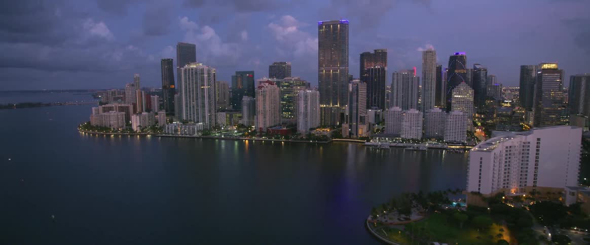 A aerial shot of a city at dusk