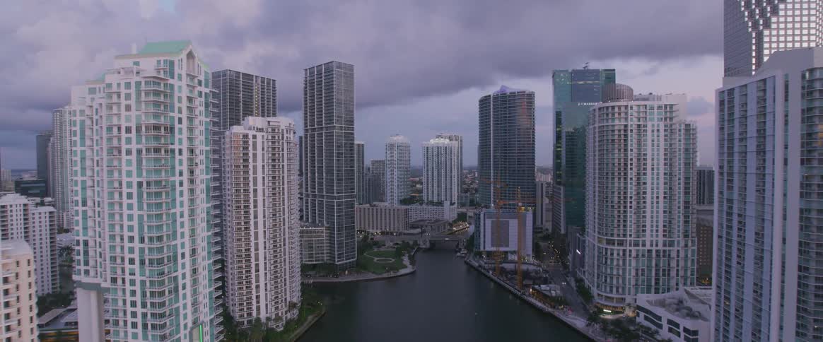 A large body of water with a city on the water