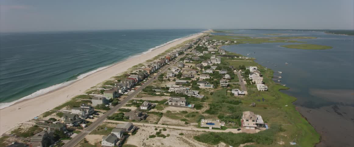 A road with houses near the beach
