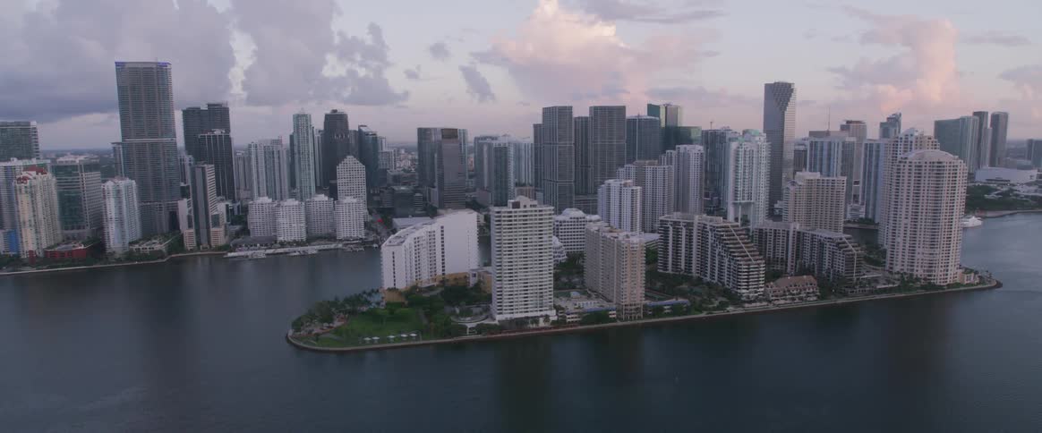 The buildings are on the islands of the city