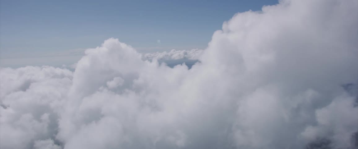 Cumulonimbus clouds from above during the day
