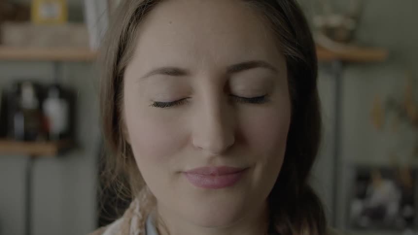 Woman thinking with her eyes closed