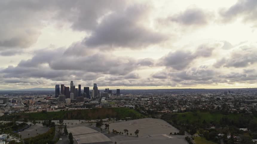 Aerial view of a dense metropolitan area and surrounding areas