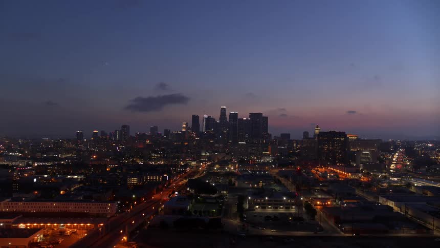 A city at night with the sky in the background