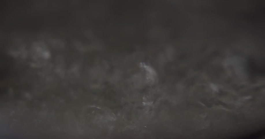 Bubbles rising in boiling water