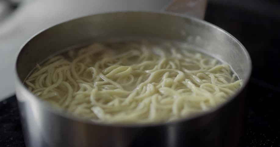 Steaming pasta in a sauce pan