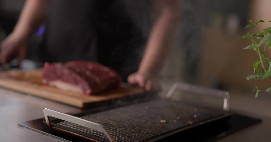 Man waiting for grill to place meat