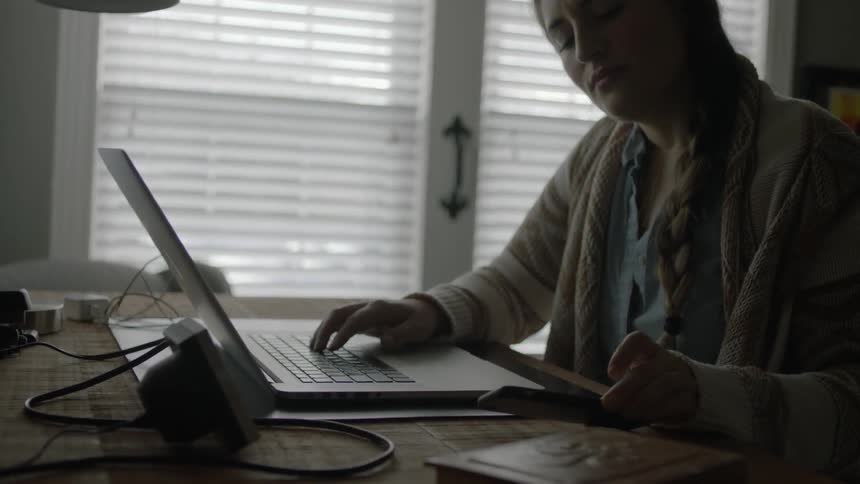 Woman Struggling With Writer's Block
