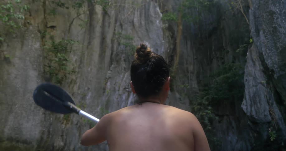 A person paddling a boat