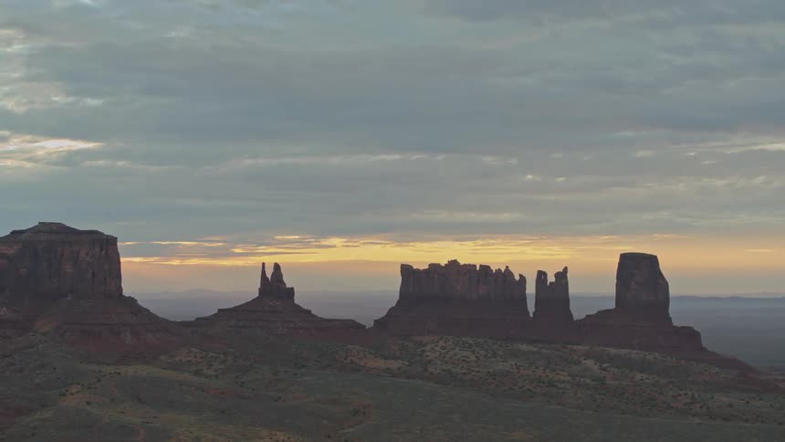 Red rock mountains under a dusky sky