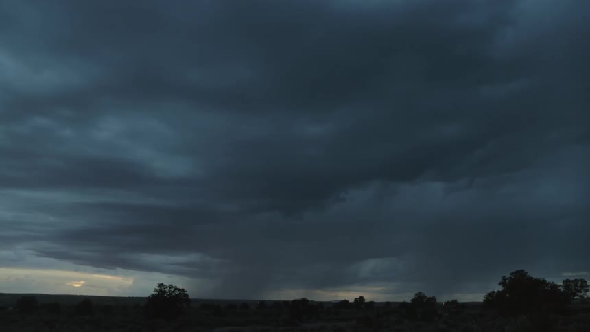 A shot of the sky at dusk during a storm