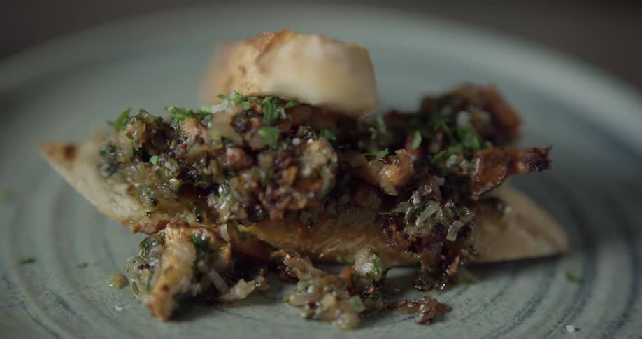 Close up of a plate of baked chicken breast