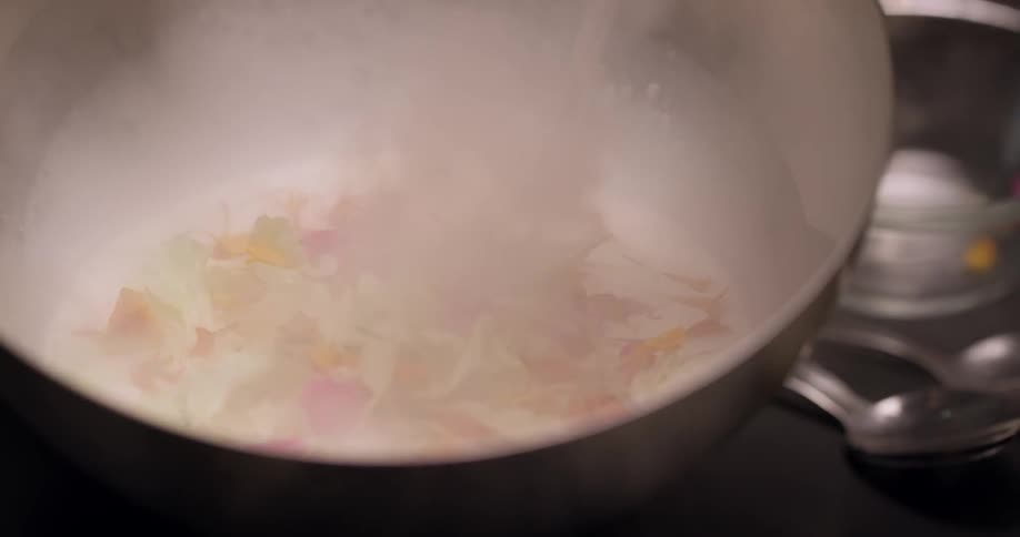 Smoke fills a pot with cream and vegetables