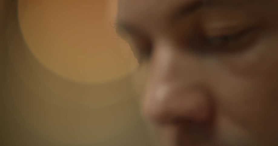 A man looking down thinking
