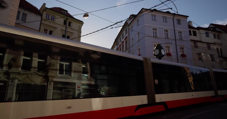 Tram passes through the city on a sunny day